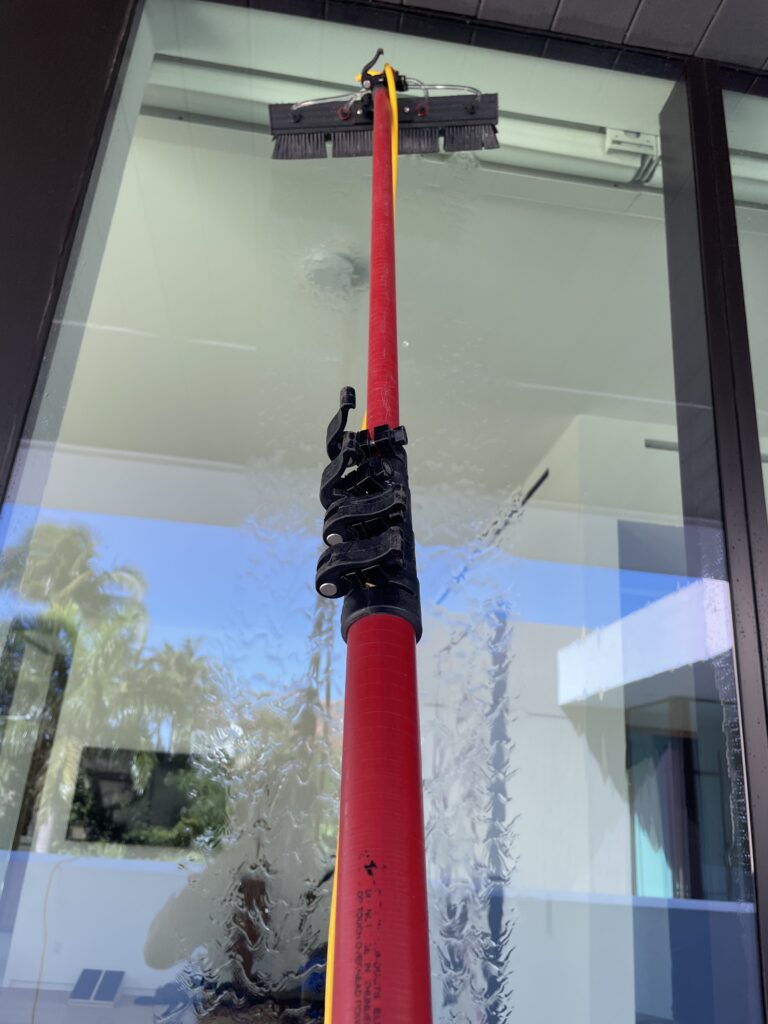 Water fed pole cleaning a big window